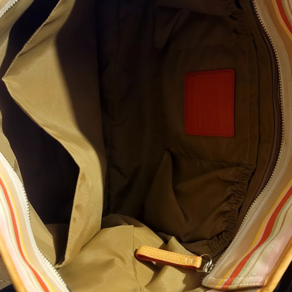Coach Lg multi color strip baby /or travel bag